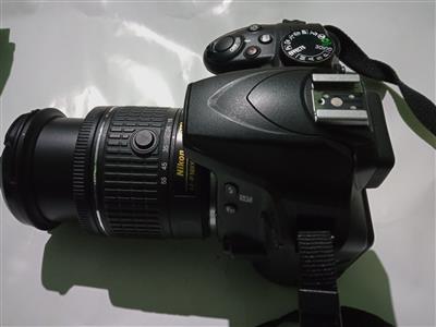 DSLR  Nikon D3400 with 18-55mm lens