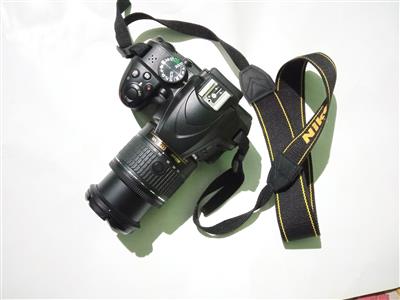 DSLR  Nikon D3400 with 18-55mm lens